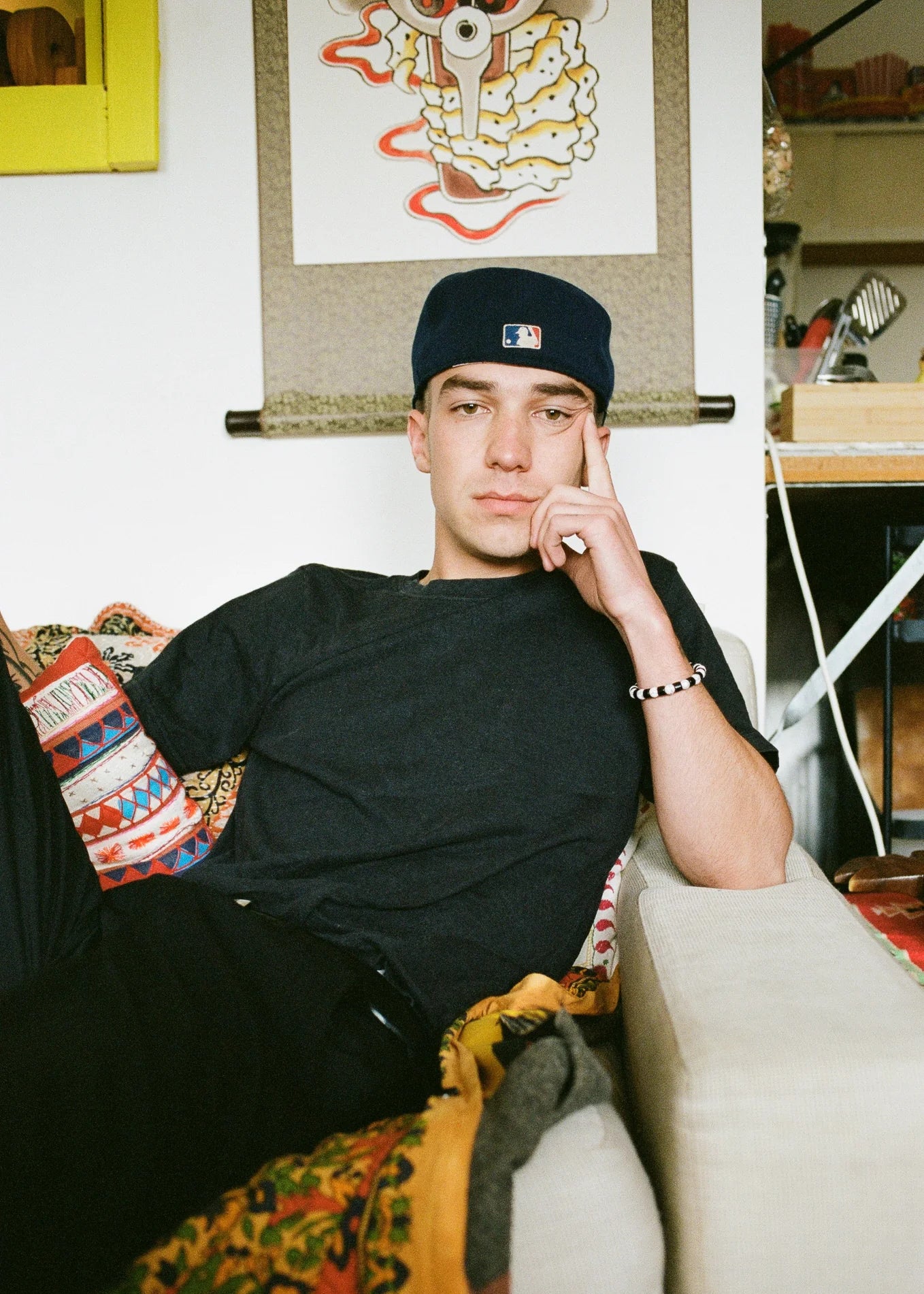 Buddy Hemp Goods Classic Tee Black On Man Sitting Front