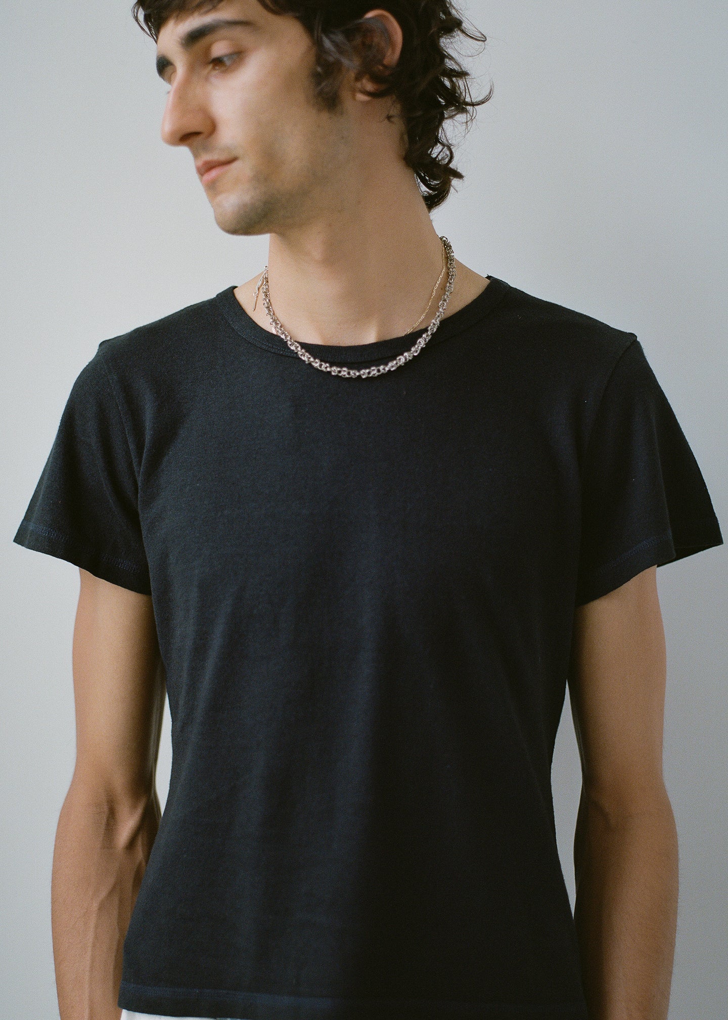 Buddy Hemp Goods Mini Tee Black On Man Front Close Up