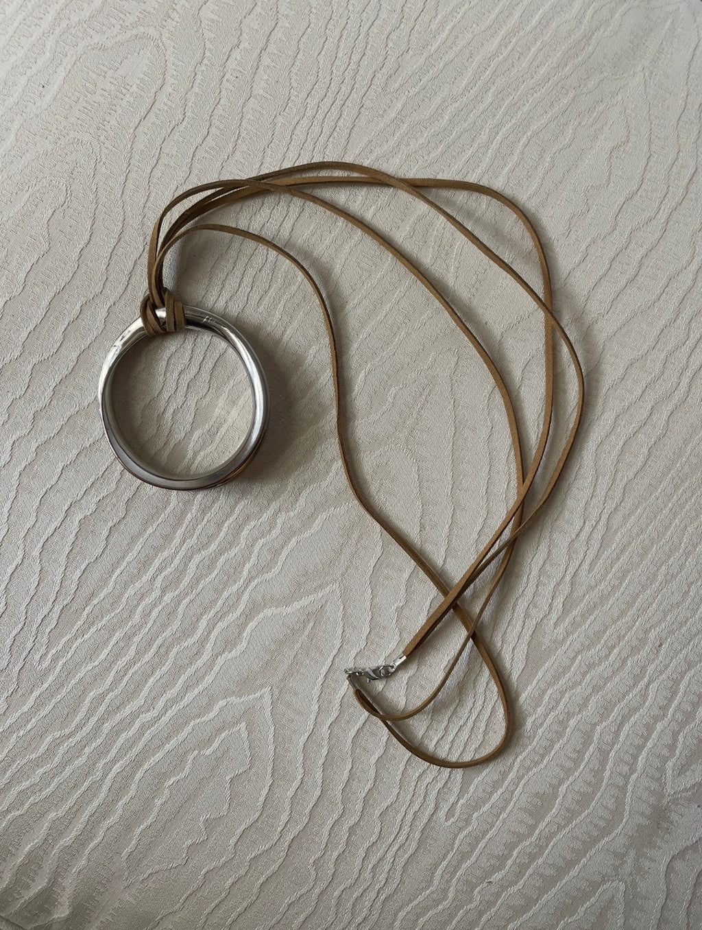 Round Silver Pendant on Leather Cord