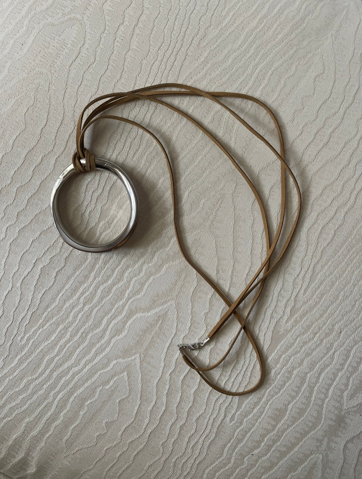 Round Silver Pendant on Leather Cord