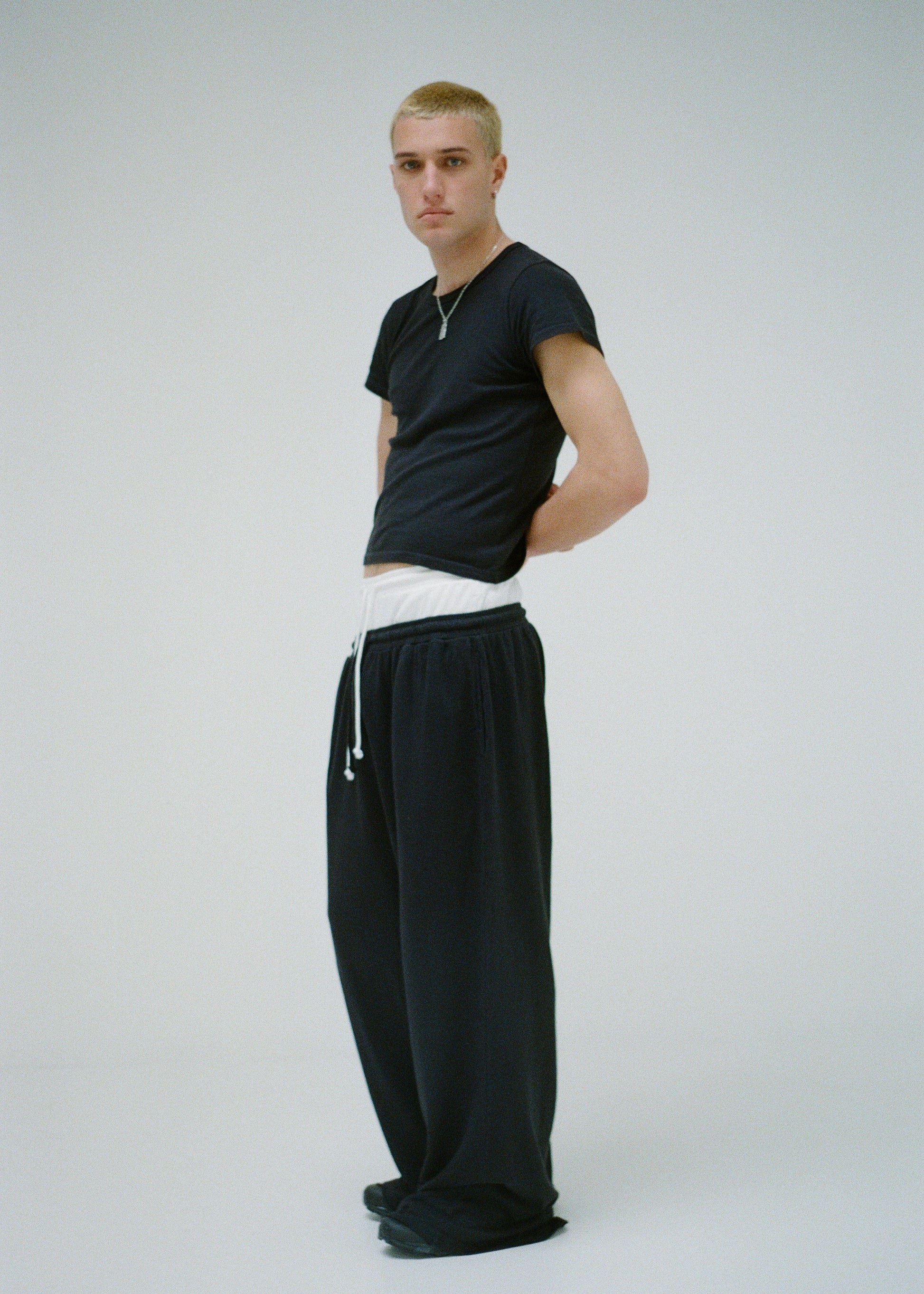 Buddy Hemp Goods Tee Pants Black On Man Front Standing