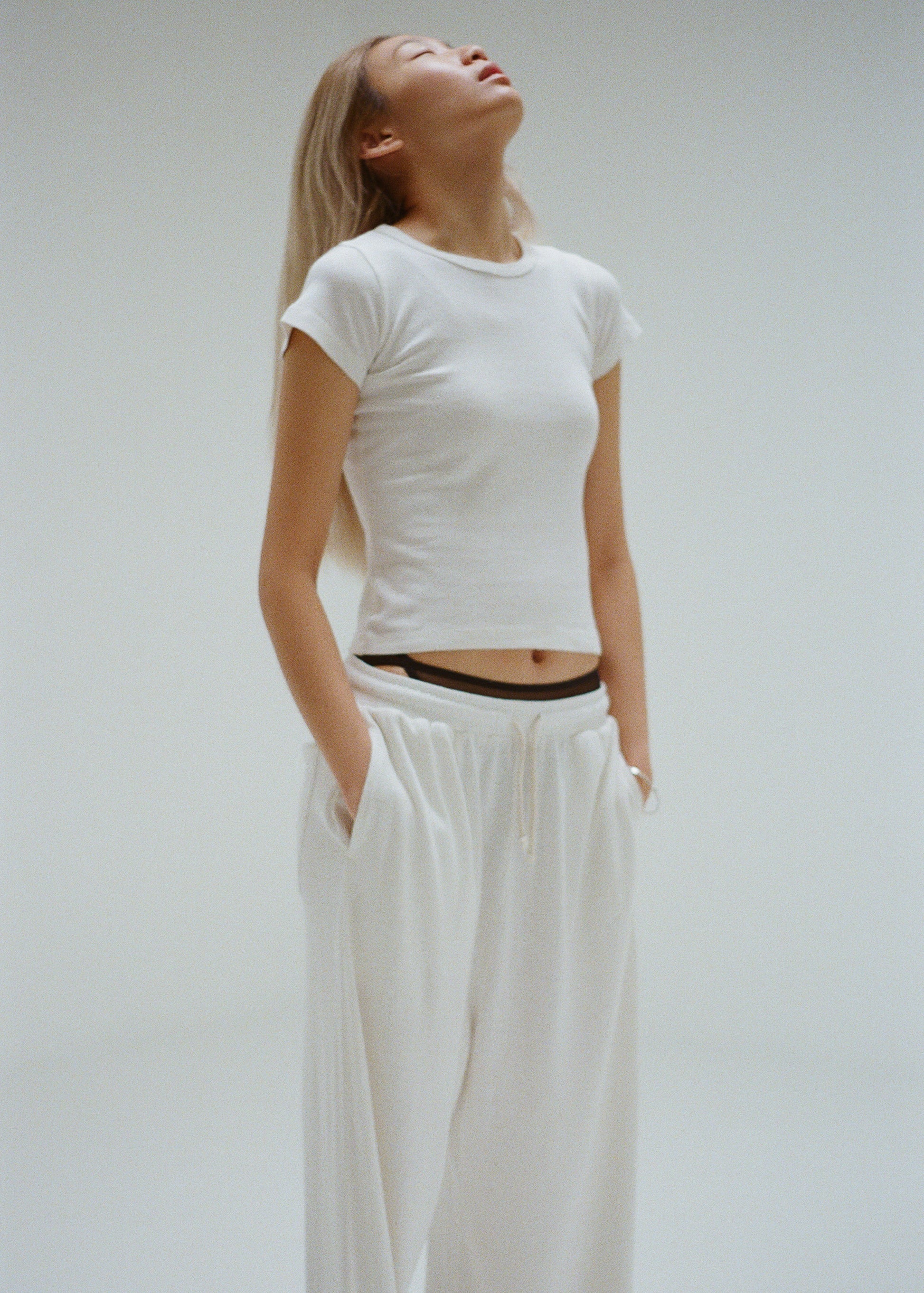 Buddy Hemp Goods Tee Pants Off White On Woman Standing Front