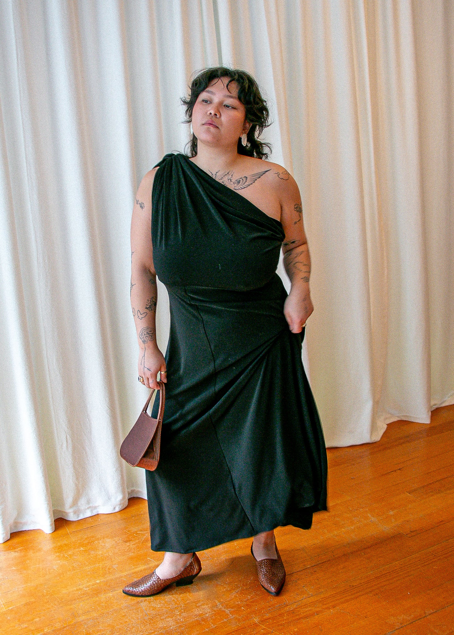 vintage black evening dress. front full body.