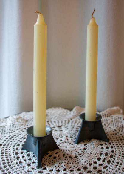 vintage candleholder pair. front detail.