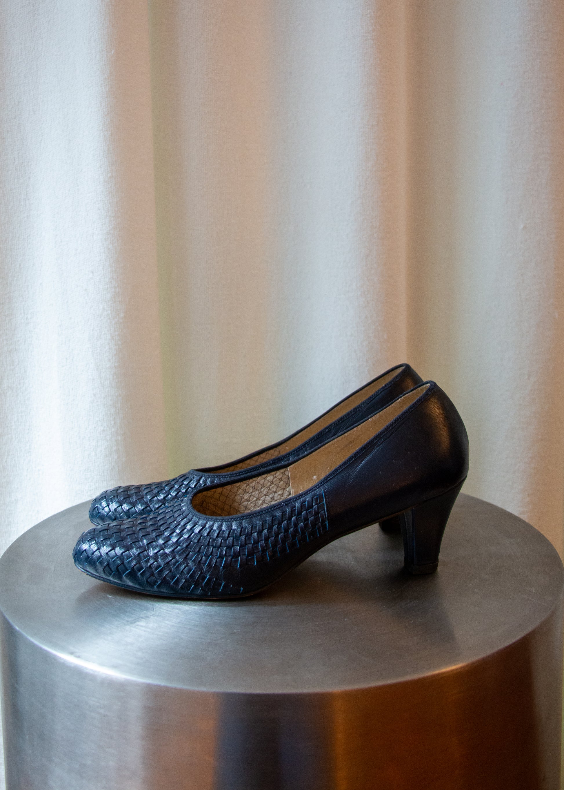 vintage woven navy leather heels. side.