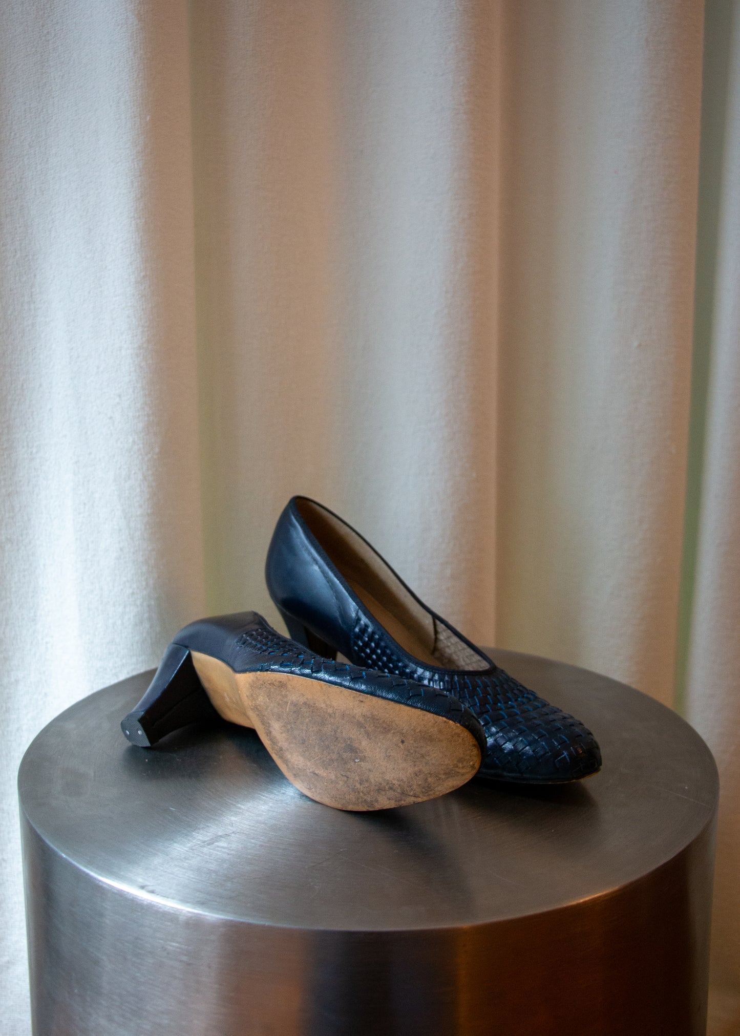 vintage woven navy leather heels. sole.